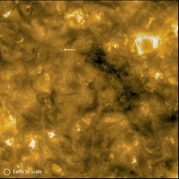 close-up of the Sun, showing mostly yellow areas with some brighter and dark er regions