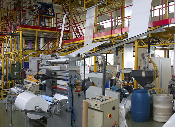 Photo showing the machinery use to make plastic bags 